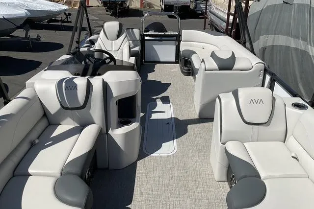Slide: The Image of 2025 Avalon LSZ QUAD LOUNGE pontoon boat with luxurious seating and modern design. - 11