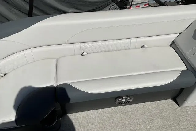 Slide: The Image of Luxurious seating on 2025 Avalon LSZ QUAD LOUNGE boat, featuring elegant upholstery and modern design. - 4