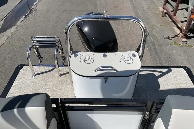 Slide: The Image of 2025 Avalon LSZ QUAD LOUNGE boat interior with seating and storage features. - 8