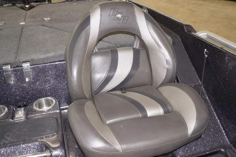 Slide: The Image of 2020 Bass Cat Lynx boat seat with cup holders and sleek design. - 16