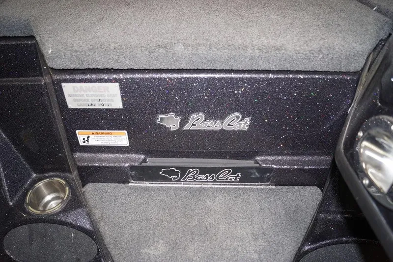 Slide: The Image of 2020 Bass Cat Lynx boat interior with logo and warning labels. - 20