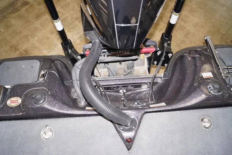 Slide: The Image of 2020 Bass Cat Lynx boat engine area with Seastar components and sleek design. - 23