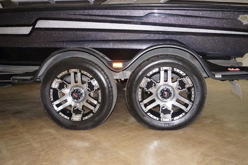 Slide: The Image of 2020 Bass Cat Lynx trailer with stylish alloy wheels and sleek design. - 6