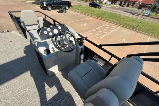 Slide: The Image of 2023 Viaggio Del Mar D20F boat interior with steering wheel and seating. - 10
