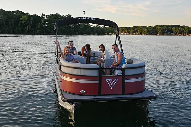 Slide: The Image of Manufacturer Provided Image: 2023 Viaggio Del Mar F boat with passengers on a serene lake. - 12