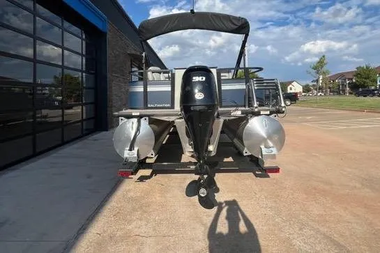 Slide: The Image of 2023 Viaggio Del Mar D20F pontoon boat with outboard motor in a sunny parking lot. - 4