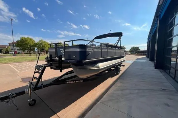 Slide: The Image of 2023 Viaggio Del Mar D20F pontoon boat on trailer, parked outdoors under clear sky. - 6
