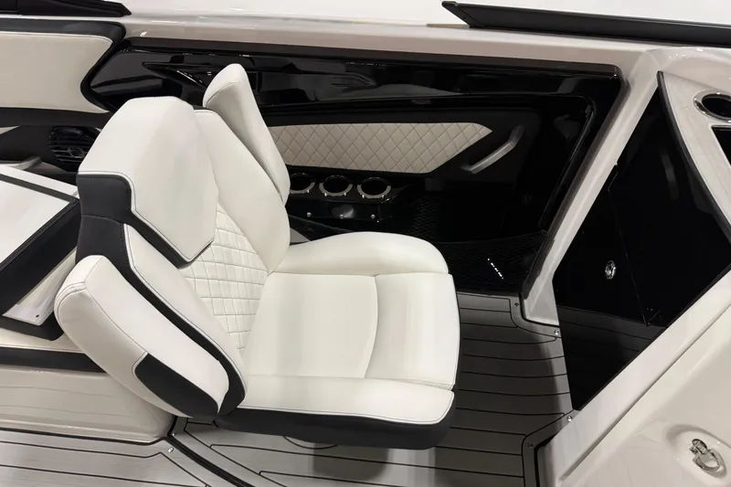 Slide: The Image of 2026 Yamaha Boats 252SD interior with luxurious white seating and sleek design. - 5