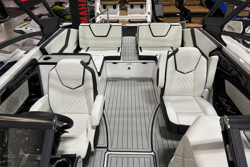 Slide: The Image of Luxurious interior of 2026 Yamaha Boats 252SD with sleek white seating and modern design. - 7