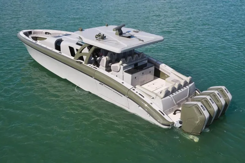 The Image of 2025 Midnight Express 52 Vitesse luxury boat docked beside a yacht in a marina. - 0