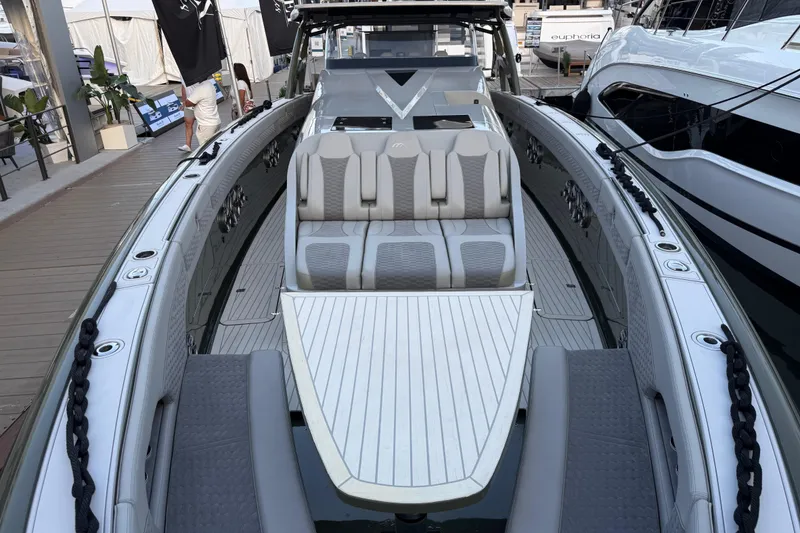 Slide: The Image of 2025 Midnight Express 52 Vitesse luxury boat with sleek design and comfortable seating. - 15