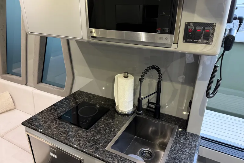 Slide: The Image of Modern kitchen area in 2025 Midnight Express 52 Vitesse yacht. - 20