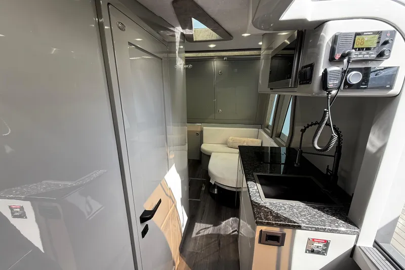 Slide: The Image of Luxurious interior of 2025 Midnight Express 52 Vitesse yacht with modern amenities. - 22