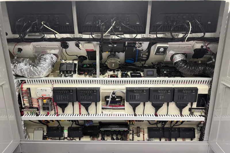 Slide: The Image of Electrical system of a 2025 Midnight Express 52 Vitesse boat, showcasing wiring and components. - 24