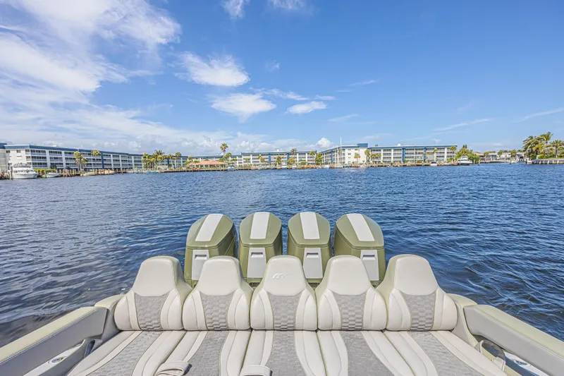 Slide: The Image of Luxury Midnight Express 52 Vitesse boat on water, showcasing sleek design and powerful engines. - 26
