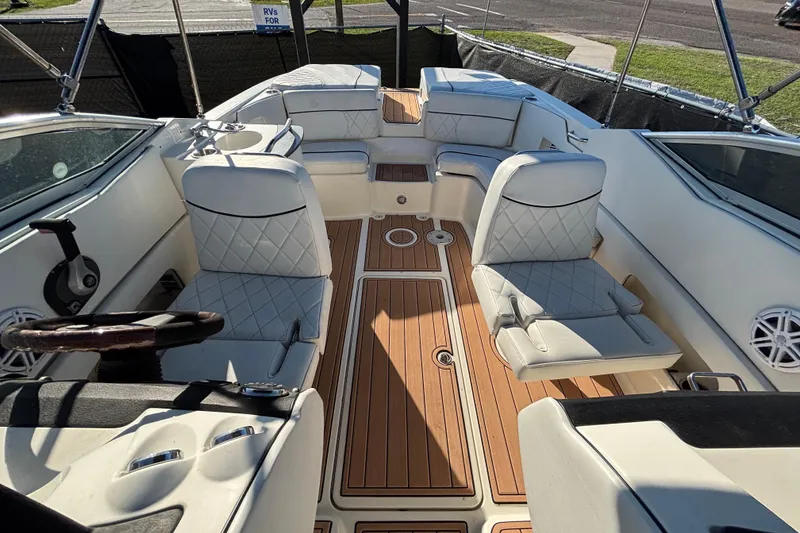 Slide: The Image of Luxurious seating on a 2007 Sea Ray SLX 250 boat with elegant upholstery. - 23