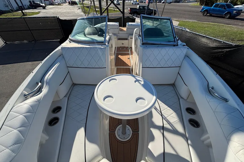 Slide: The Image of 2007 Sea Ray SLX 250 boat interior with battery switch and storage compartment. - 28