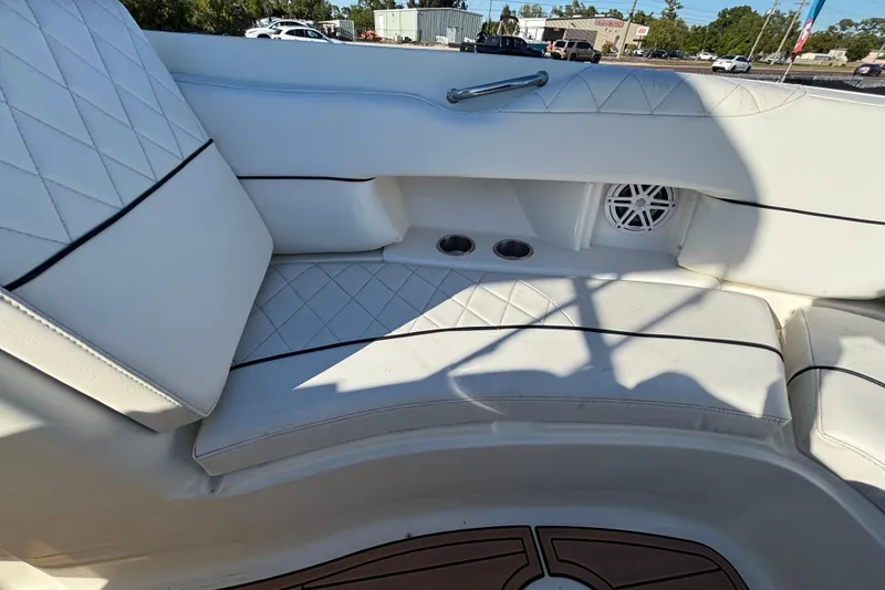 Slide: The Image of Storage compartment on a 2007 Sea Ray SLX 250 boat, featuring interior wiring and carpeted walls. - 31