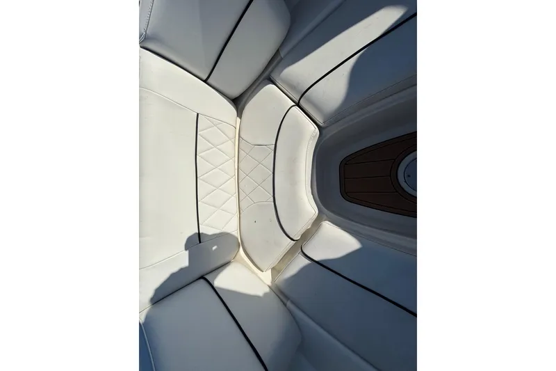 Slide: The Image of 2007 Sea Ray SLX 250 boat interior with sink and seating area. - 33