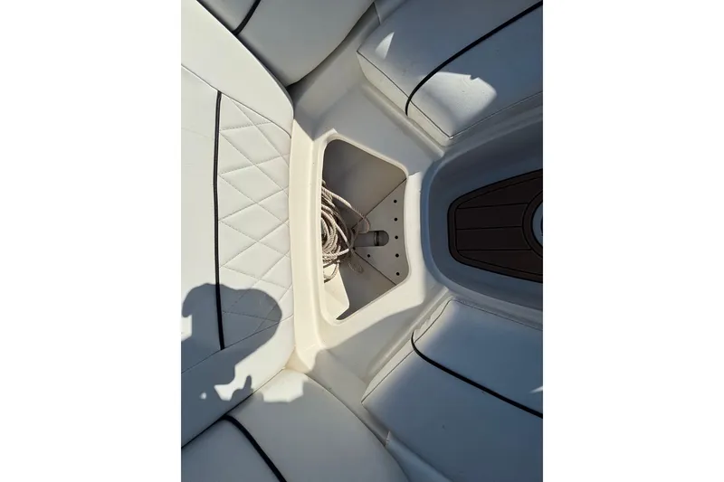 Slide: The Image of Interior of 2007 Sea Ray SLX 250 boat with steering wheel and dashboard. - 34