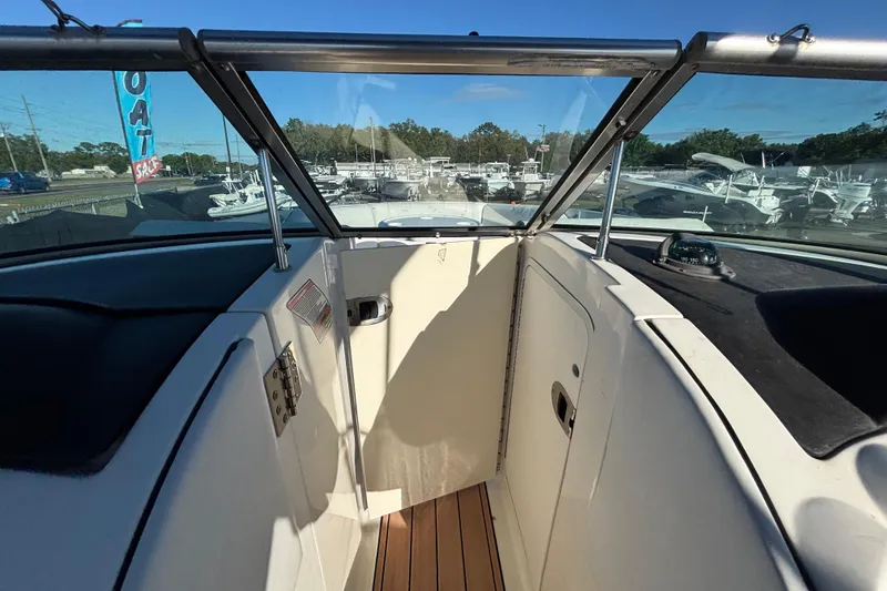 Slide: The Image of 2007 Sea Ray SLX 250 dashboard with windshield, featuring sleek design elements. - 44