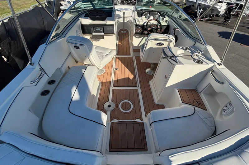Slide: The Image of Interior view of a 2007 Sea Ray SLX 250 boat with storage compartment. - 58