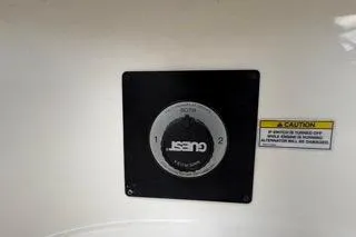 Slide: The Image of Close-up of a 2007 Sea Ray SLX 250 boat control panel with caution label. - 85