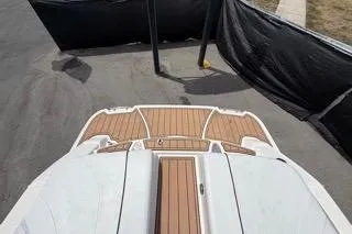 Slide: The Image of 2007 Sea Ray SLX 250 boat with teak deck, viewed from above. - 95
