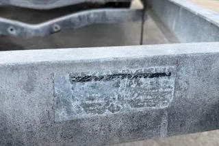 Slide: The Image of Close-up of a weathered metal surface on a 2007 Sea Ray SLX 250. - 98