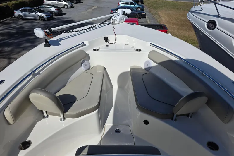 Slide: The Image of 2021 Key West 244 Center Console boat interior with seating and fishing equipment. - 14