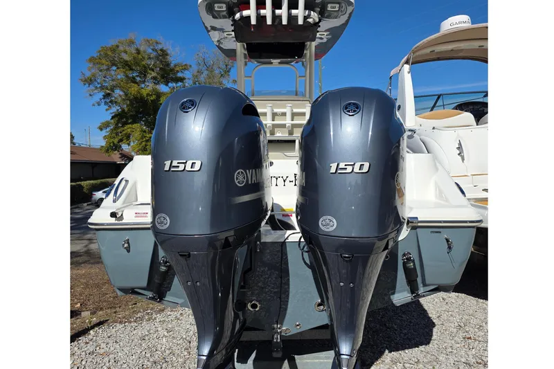 Slide: The Image of Key West 244 Center Console 2021 with twin Yamaha 150 engines. - 4