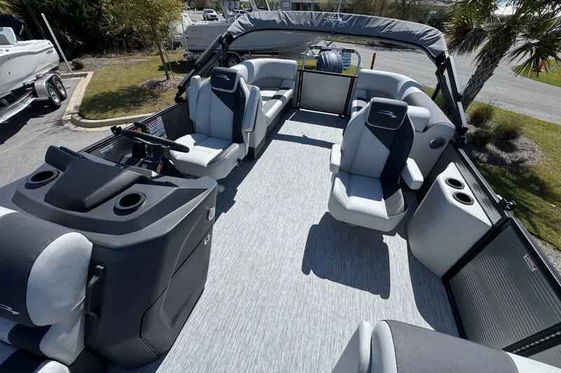 Slide: The Image of 2026 Bennington 22 SSR pontoon boat interior with modern seating and helm. - 8