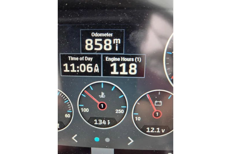 Slide: The Image of Dashboard of 2022 Regal 2000 ES Bowrider showing odometer, engine hours, and gauges. - 10