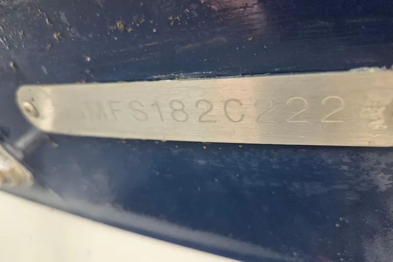 Slide: The Image of Close-up of a 2022 Regal 2000 ES Bowrider hull identification number plate. - 13
