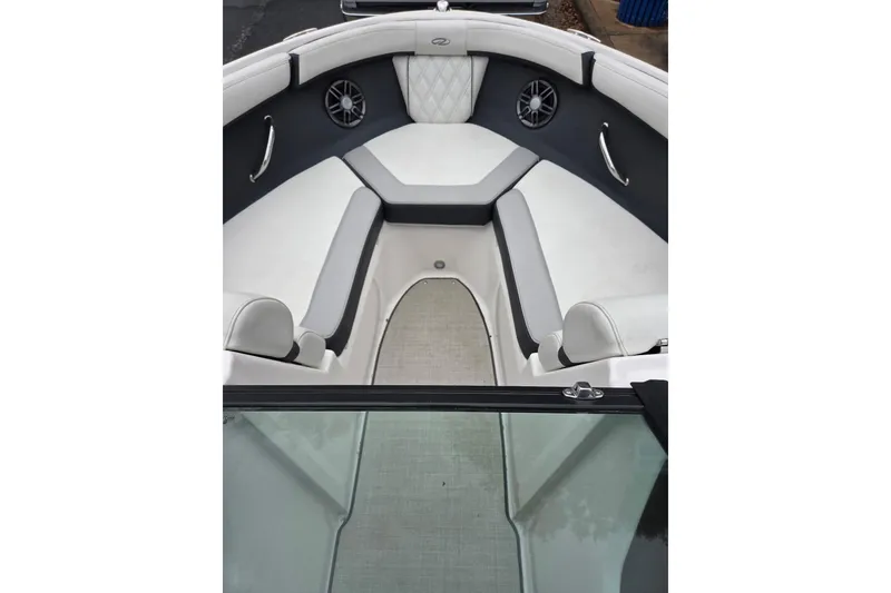 Slide: The Image of 2022 Regal 2000 ES Bowrider interior with white and gray seating, modern design. - 3