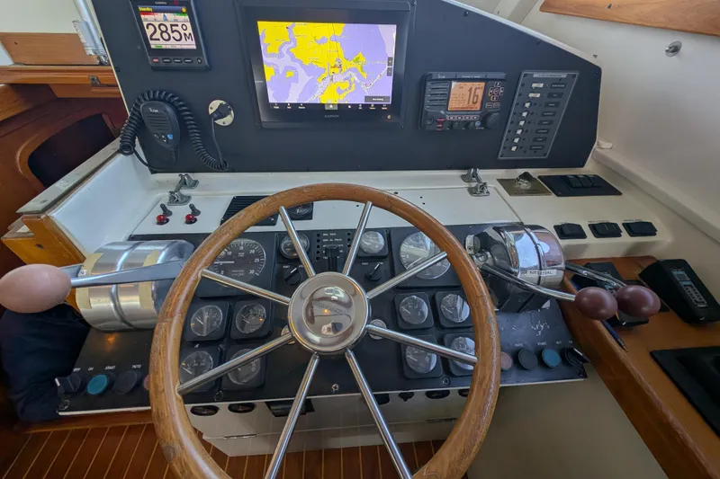 Slide: The Image of Cockpit of 1998 Little Harbor WhisperJet 55 with navigation instruments and steering wheel. - 20