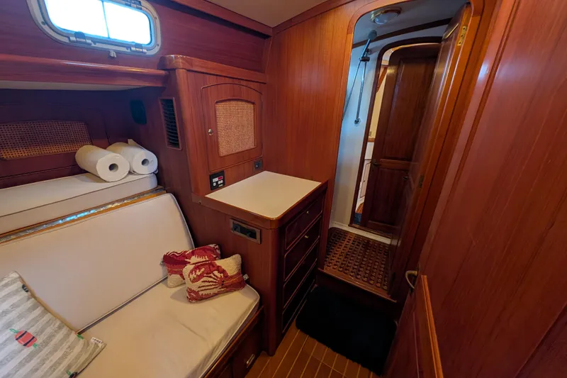 Slide: The Image of Cozy cabin interior of 1998 Little Harbor WhisperJet 55 yacht with wooden finish. - 31