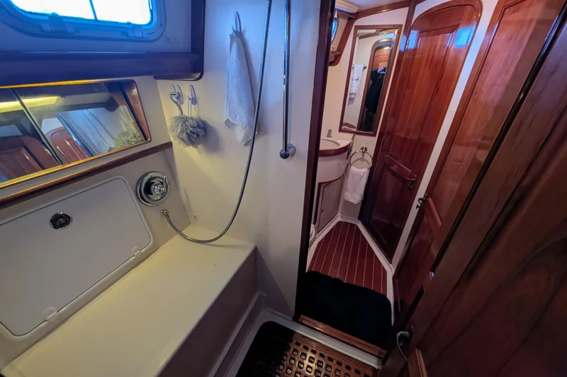 Slide: The Image of Luxurious bathroom interior of 1998 Little Harbor WhisperJet 55 yacht with wooden accents. - 33