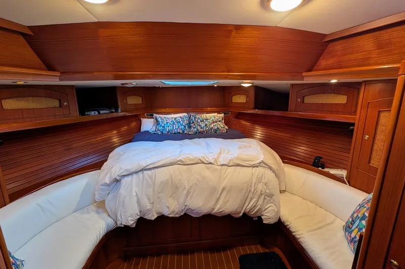 Slide: The Image of Luxurious cabin interior of 1998 Little Harbor WhisperJet 55 yacht with cozy bedding. - 36