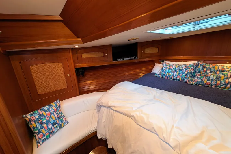 Slide: The Image of Luxurious cabin interior of 1998 Little Harbor WhisperJet 55 yacht with cozy bedding. - 37