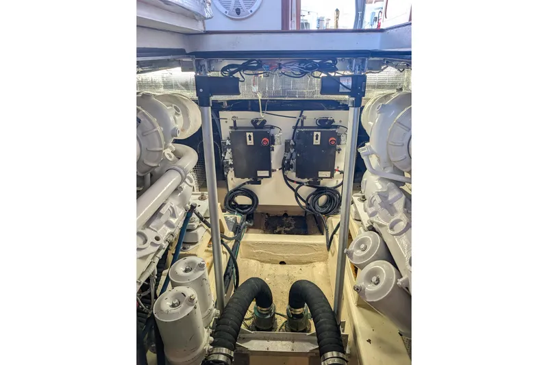 Slide: The Image of Engine room of 1998 Little Harbor WhisperJet 55 yacht, showcasing mechanical components and systems. - 8