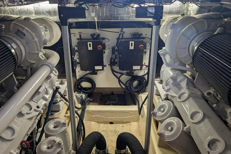 Slide: The Image of Engine room of 1998 Little Harbor WhisperJet 55 yacht, showcasing mechanical components. - 9