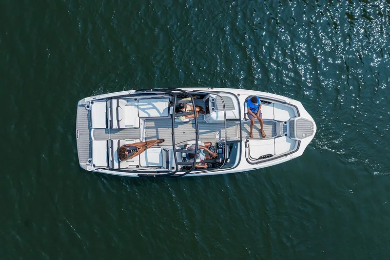 Slide: The Image of Manufacturer Provided Image: Aerial view of 2026 Yamaha Boats 252S on water with passengers relaxing. - 12
