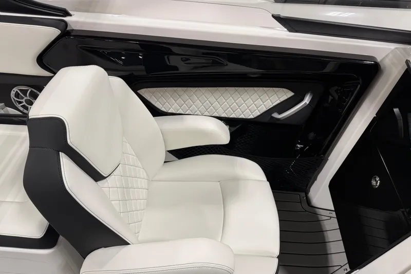 Slide: The Image of Luxurious interior of 2026 Yamaha Boats 252S, featuring sleek white seating and modern design. - 6