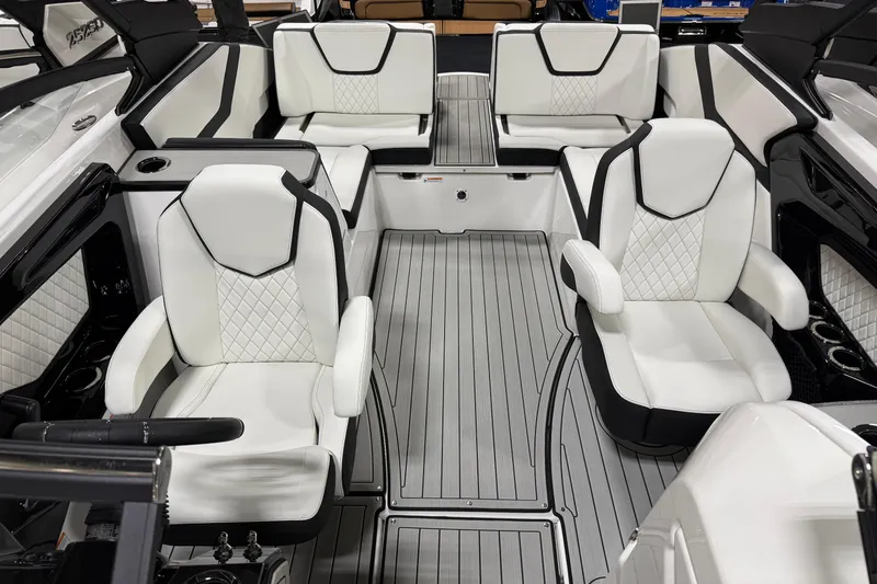 Slide: The Image of Luxurious interior of 2026 Yamaha Boats 252S with sleek white seating and modern design. - 8