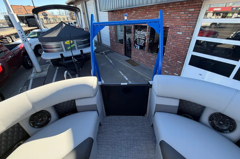 Slide: The Image of 2026 Berkshire 25RFX DC STS SPORT ARCH pontoon boat interior at dealership. - 17