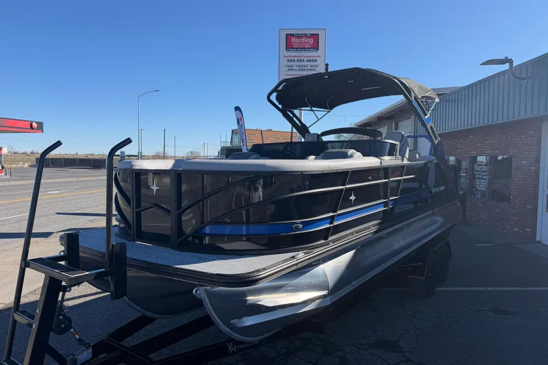 Slide: The Image of 2026 Berkshire 25RFX DC STS SPORT ARCH pontoon boat displayed outdoors. - 7