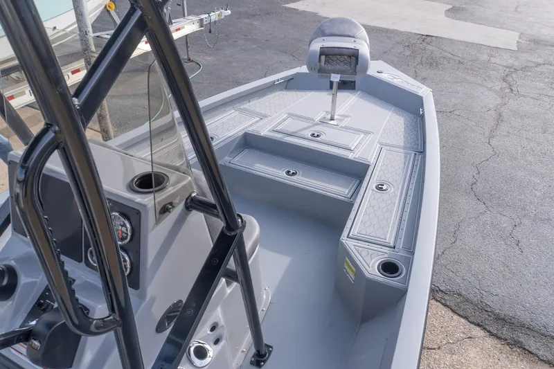 Slide: The Image of 2026 G3 Bay 21 GX boat interior with seating and storage compartments. - 12