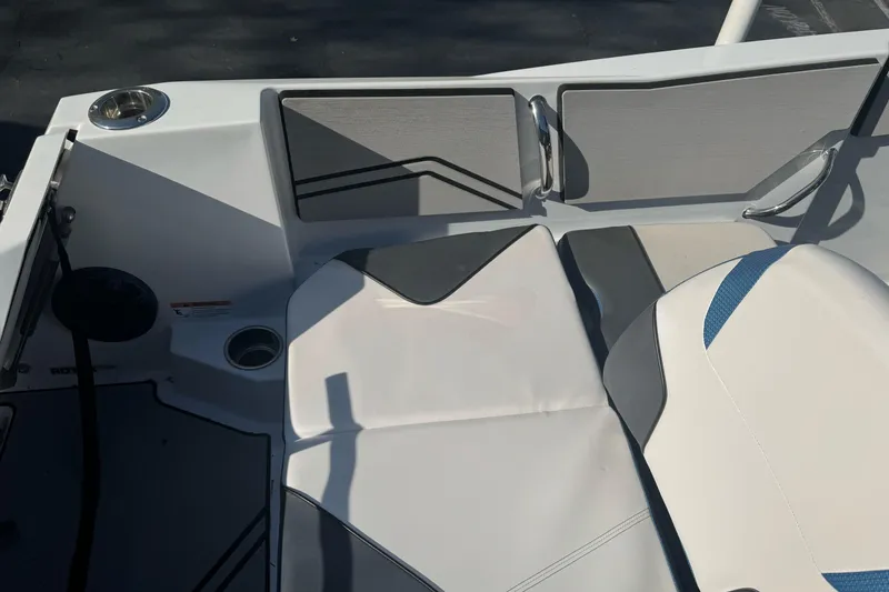 Slide: The Image of Interior seating of 2020 Scarab 255 Open ID boat, featuring modern design and cup holders. - 10