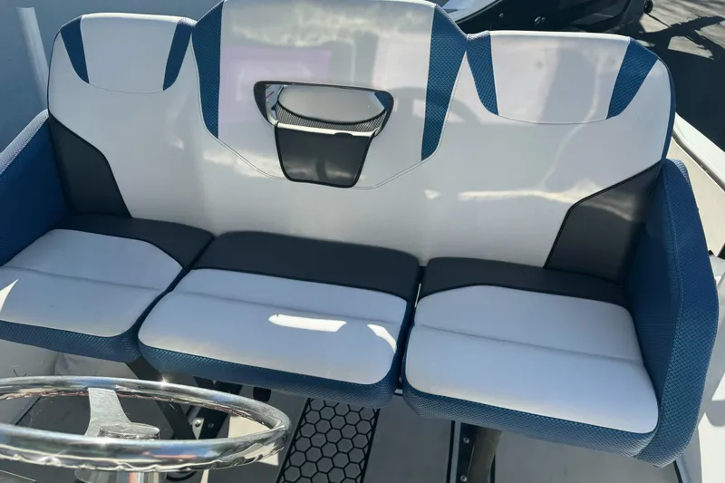 Slide: The Image of 2020 Scarab 255 Open ID boat seating with blue and white upholstery. - 16